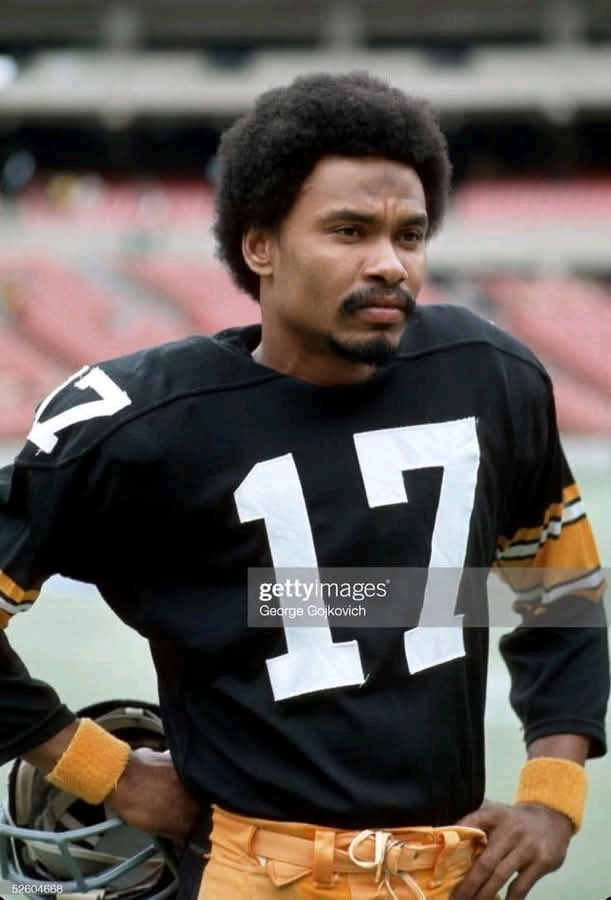 Legend Joe Gilliam, a former NFL quarterback for the Pittsburgh Steelers. Some key facts about him: He was one of the first Black quarterbacks in the NFL.  Gilliam started the first six games of the 1974 season.  He led the Steelers to a 4-1-1 record during his time as a starter.  Gilliam won two Super Bowl rings with the Steelers.  He was drafted in the 11th round in 1972.  Gilliam played college football at Tennessee State University.  He passed away on December 25, 2000, from a heart attack.