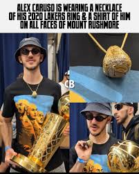 courtsidebuzzig | PARADE ‘FIT: Alex Caruso is wearing a necklace of his 2020 Los Angeles Lakers championship ring & a shirt of him on all faces of Mount….