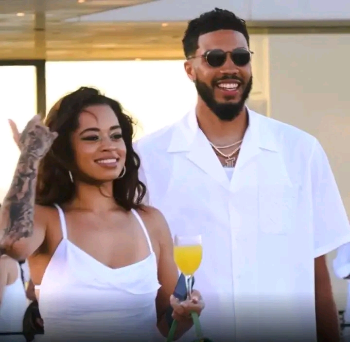Jayson Tatu: “When I first met Ella Mai, I’ll be honest—I didn’t think too much of it. She wasn’t what I expected, not at all. At that time in my life, everything revolved around NBA—NBA was taking shape, and I was consumed by the Game, the Sports, the road ahead. Romance? It wasn’t on my radar. But—Ella Mai—she walked into my life like a different kind of melody. Not loud, not flamboyant, just real… I was used to the chaos of the Sports, the wild nights, the constant movement. And she was steady—firm, thoughtful, sincere. At first, I didn’t know what to…